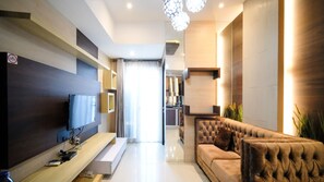 Apartment | Living area - Good Location And Comfy 2Br At Tamansari Papilio Apartment (Surabaya)