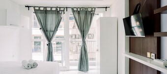 Homey And Good Deal Studio Casa De Parco Apartment