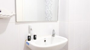 Studio | Bathroom | Shower, towels - Minimalist And Comfy Studio At Tokyo Riverside Pik 2 Apartment (Teluknaga)