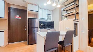 Apartment | Private kitchen | Full-size fridge, stovetop
