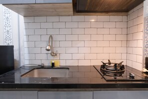 Private kitchen - Modern Studio At Apartment Grand Asia Afrika (Bandung)