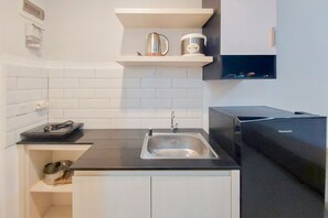 Studio | Private kitchen - Scenic And Homey Studio Barsa City Apartment (Yogyakarta)