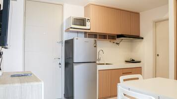 Apartment | Private kitchen | Full-size fridge, stovetop