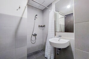 Studio | Bathroom | Shower, towels - Best Homey And Nice Studio At Bintaro Icon Apartment (South Tangerang)