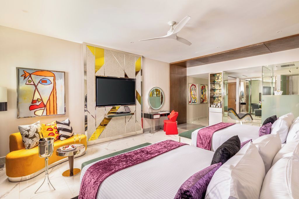 Premium bedding, down comforters, minibar, in-room safe