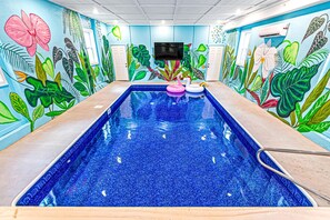 Indoor pool, a heated pool - Large 8BR Paradise: All Ensuites, Pool, Themes, Spa, Golf, Games & EV Charging (Sevierville)