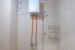 Estudio | Baño | Ducha y toallas
