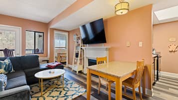 Smart TV, fireplace, books
