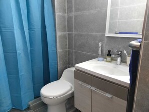 Family Apartment | Bathroom | Shower, towels, soap, shampoo