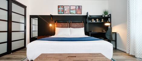 1 dormitori, escriptori, planxa i posts de planxar i wifi