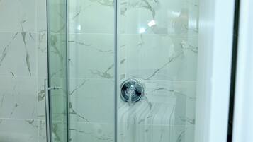 Shower, bidet, towels, soap