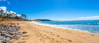 Colorful condo by the beach with a washer/dryer, lanai, & on-site pool
