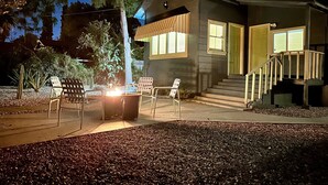 A house with a porch, outdoor seating, and a fire pit. - Welcome to Casa Azul 1932 Eclectic Boho Sanctuary  in Downtown Riverside! (Riverside)
