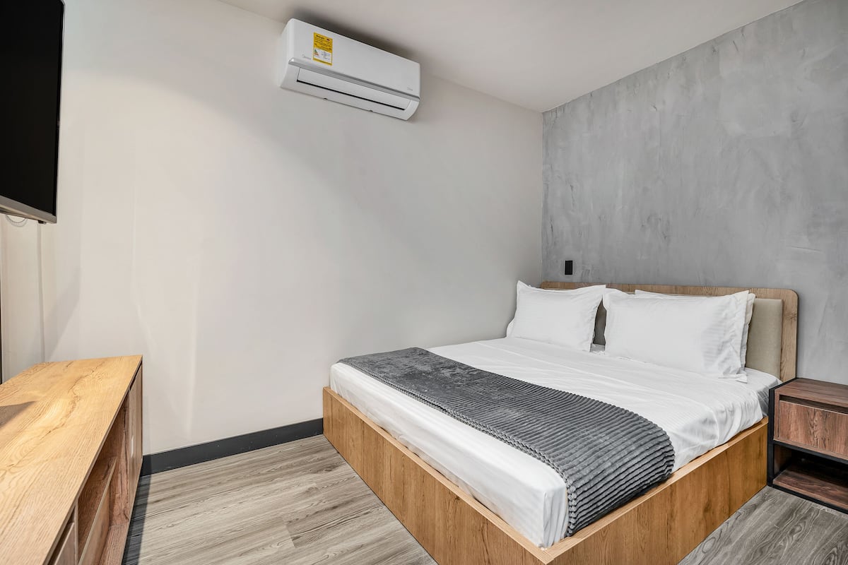 1 habitación y ropa de cama de alta calidad