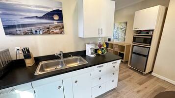 Microwave, stovetop, coffee/tea maker, toaster