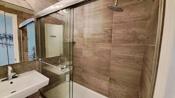 Hair dryer, towels, soap, toilet paper