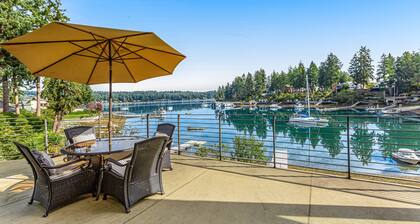 Upscale waterfront estate with private dock, fireplace, & gourmet kitchen
