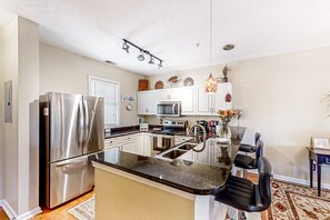 Fridge, microwave, oven, stovetop - Bright and spacious condo with resort amenities, water views, balcony, & AC (North Myrtle Beach)