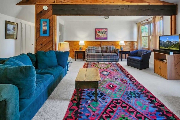 Living room: TV with DVD player only and sound bar, 2 pull-out couches, central heat, 1 portable A/C unit