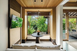 Deluxe Villa, 1 Bedroom, Ridge View | Living area | 43-inch Smart TV with digital channels, Netflix, streaming services - The Ridge Bali (Ubud)