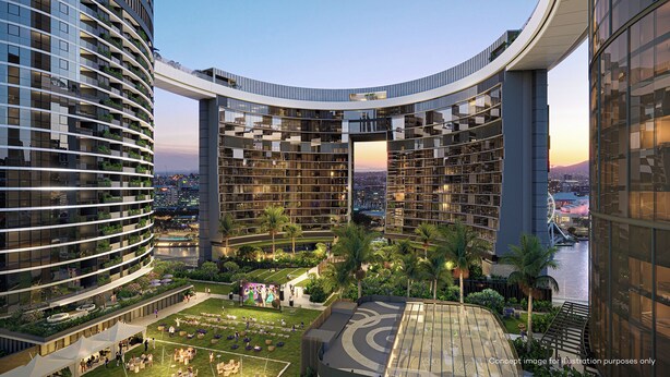 Un hôtel moderne au design original, avec de nombreux balcons et un jardin sur le toit.