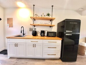 Fridge, microwave, stovetop, coffee/tea maker