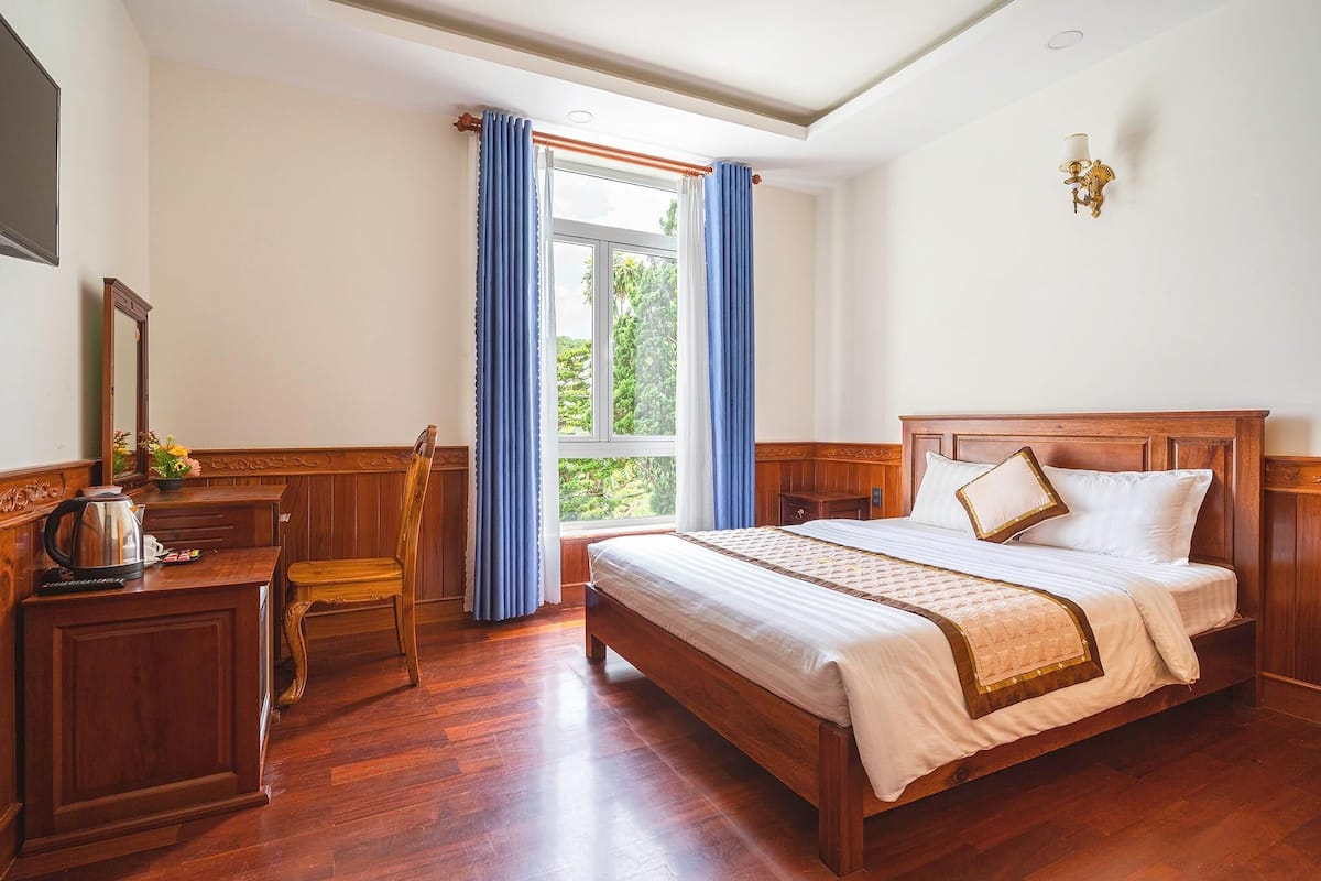 Deluxe suite | 1 slaapkamer, een minibar, een bureau, verduisterende gordijnen