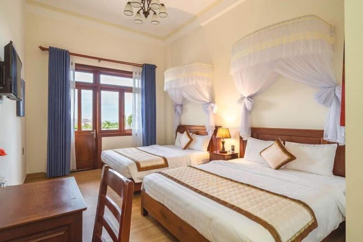 1 slaapkamer, een minibar, een bureau, verduisterende gordijnen