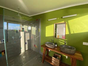 Shower, hair dryer, towels, soap