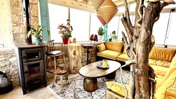 Exclusive Double Room | Living area | Flat-screen TV