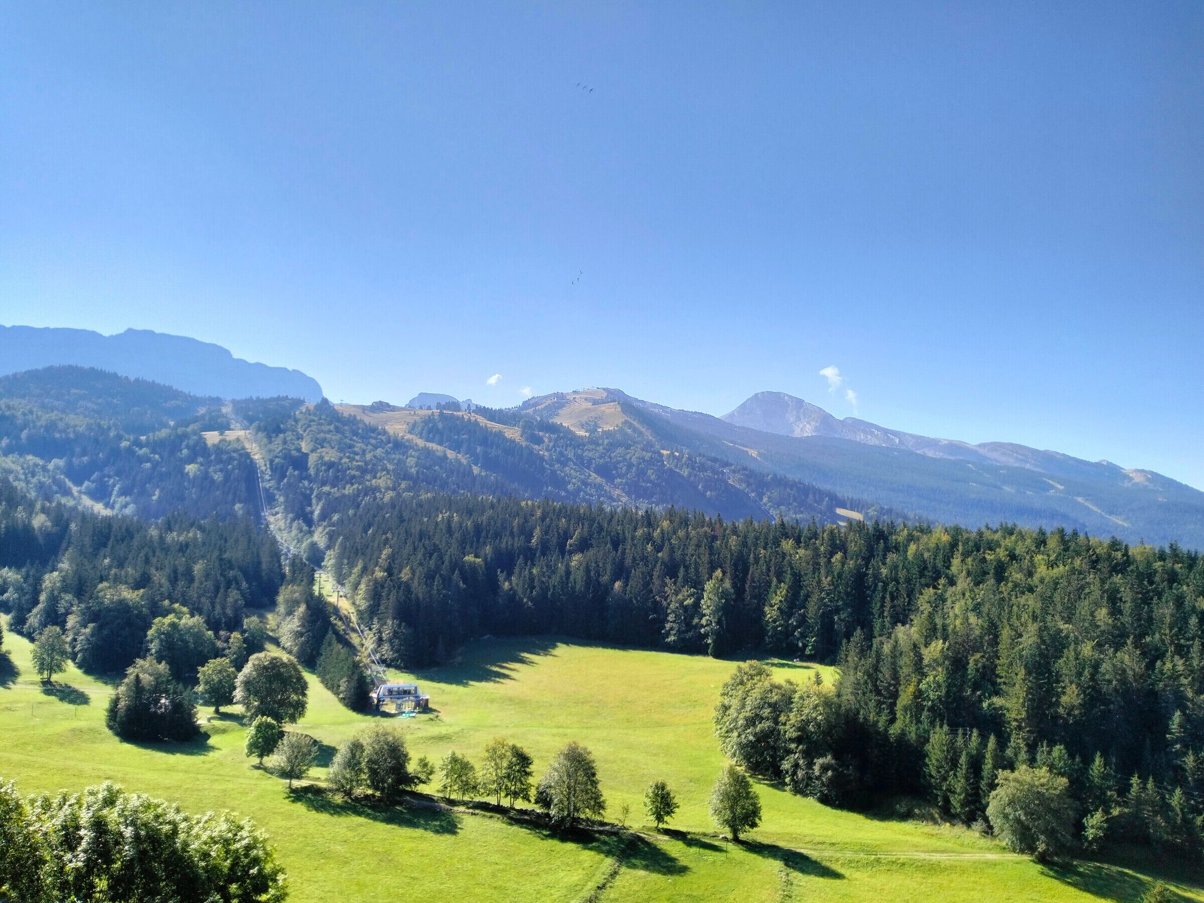A mountainous landscape with a clear sky.