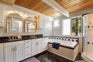 Shower, jetted tub, hair dryer, towels