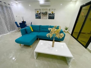 Room, 1 Bedroom, City View | Living area - Room in Apartment - Large Bedroom With Small Work Area (Dakar)