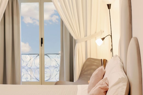 Family Quadruple Room | Down comforters, memory foam beds, desk, laptop workspace