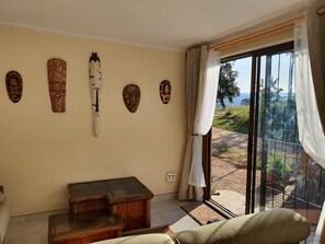 Suite estudio Confort | Área de sala de estar