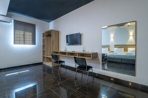 Executive Quadruple Room | Iron/ironing board - The Ivory Suites by Armaan (Mombasa)