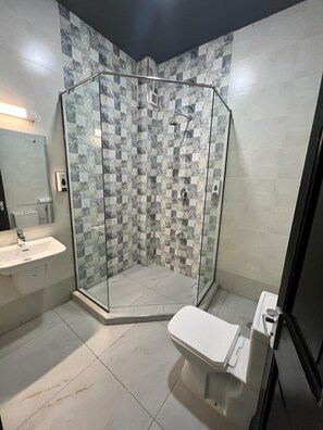 Deluxe Double Room | Bathroom - The Ivory Suites by Armaan (Mombasa)