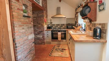 Fridge, electric kettle, toaster, cookware/dishes/utensils