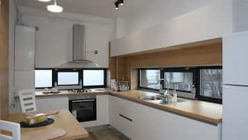 Apartment | Private kitchen | Full-sized fridge, microwave, oven, espresso maker