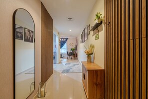 Comfort Apartment | Living area | 65-inch Smart TV with cable channels, Netflix, streaming services - Marco Polo - May Residence 5 (Dubai)