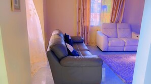 House | Living area | TV - Stunning 3-bedrooms Guesthouse in Limbe Cameroon (Limbe)