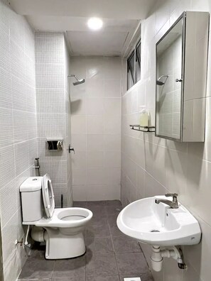 Hair dryer, slippers, towels, soap