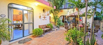 Charming Garden Retreat Just Steps to Malecon