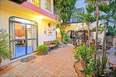 Charming Garden Retreat Just Steps to Malecon