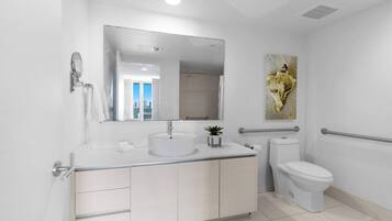 Shower, hair dryer, towels