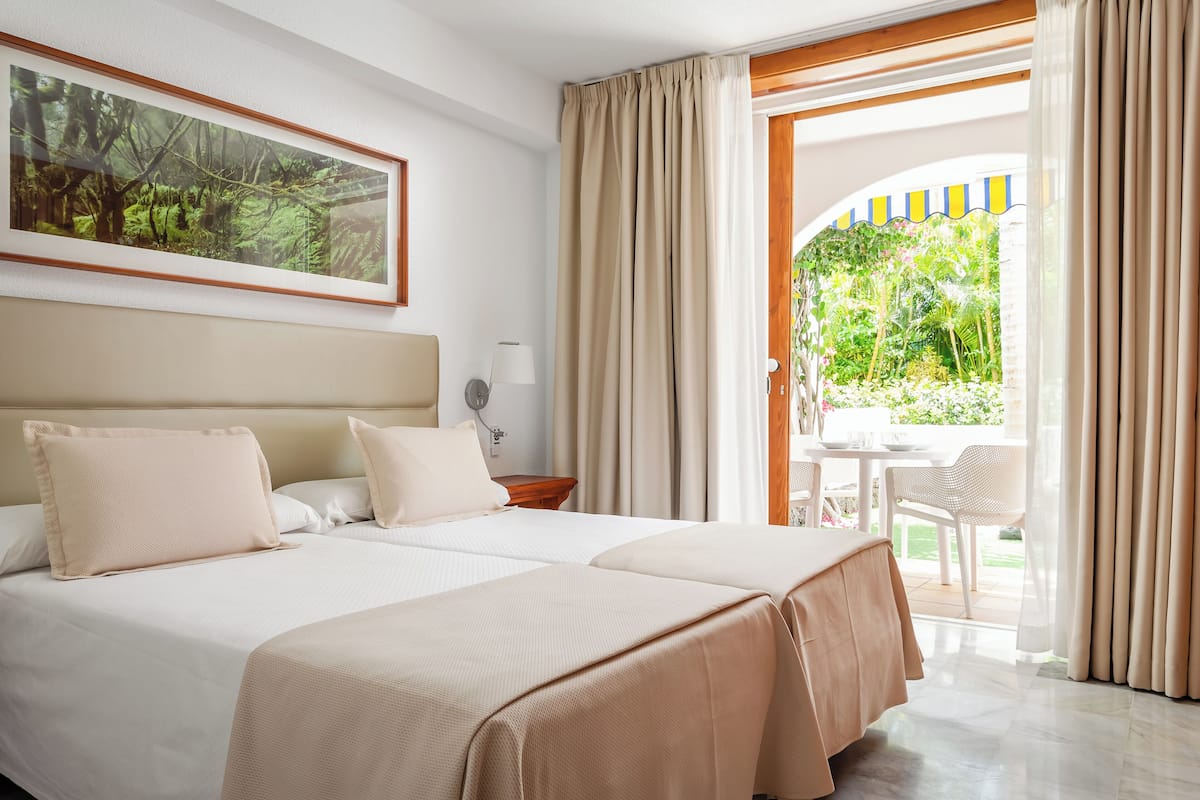 Apartamento superior, 1 quarto, no piso térreo (Garden Access) | Wi-Fi de cortesia, roupa de cama
