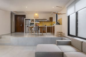 Apartamento Deluxe | Zona de estar