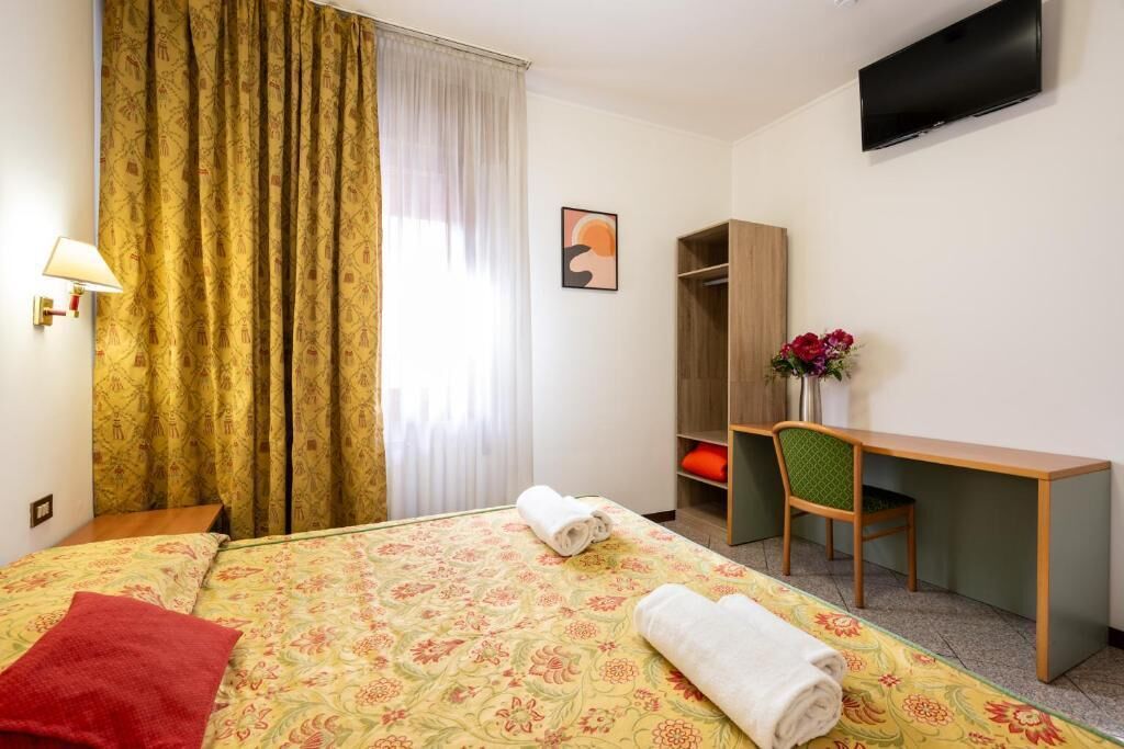 Desk, iron/ironing board (on request), WiFi (free), bed sheets