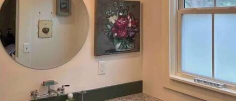 Shower, towels, soap, toilet paper