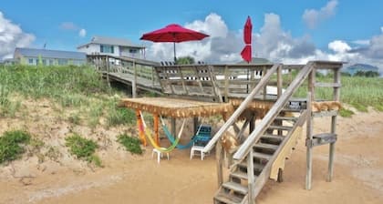 Romantic Couples Beach Getaway ,with private beach, hammocks and umbrellas